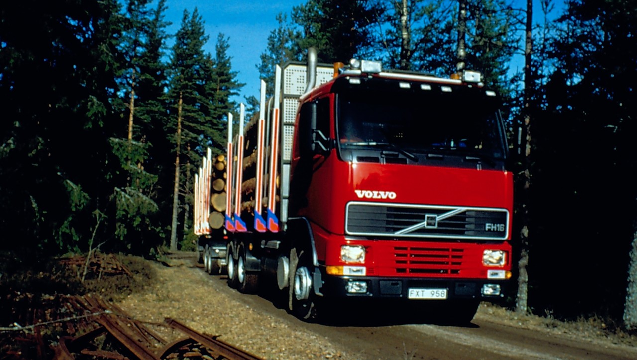 A Volvo FH in driving downhill in forest
